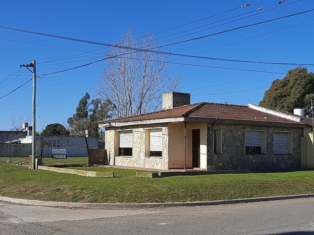 Casa más lote contiguo indiviso